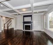Built in cabinetry & coffered ceiling are details you will find in a Custom home built by Waterford Homes